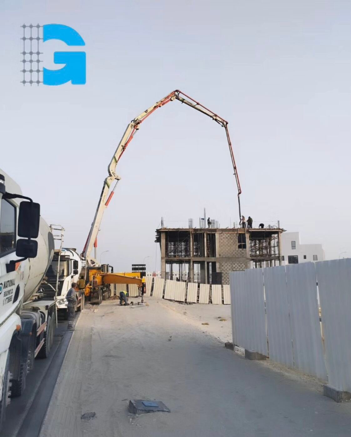 Site permit board listing Gravity Contracting as main contractor with Roma Engineering