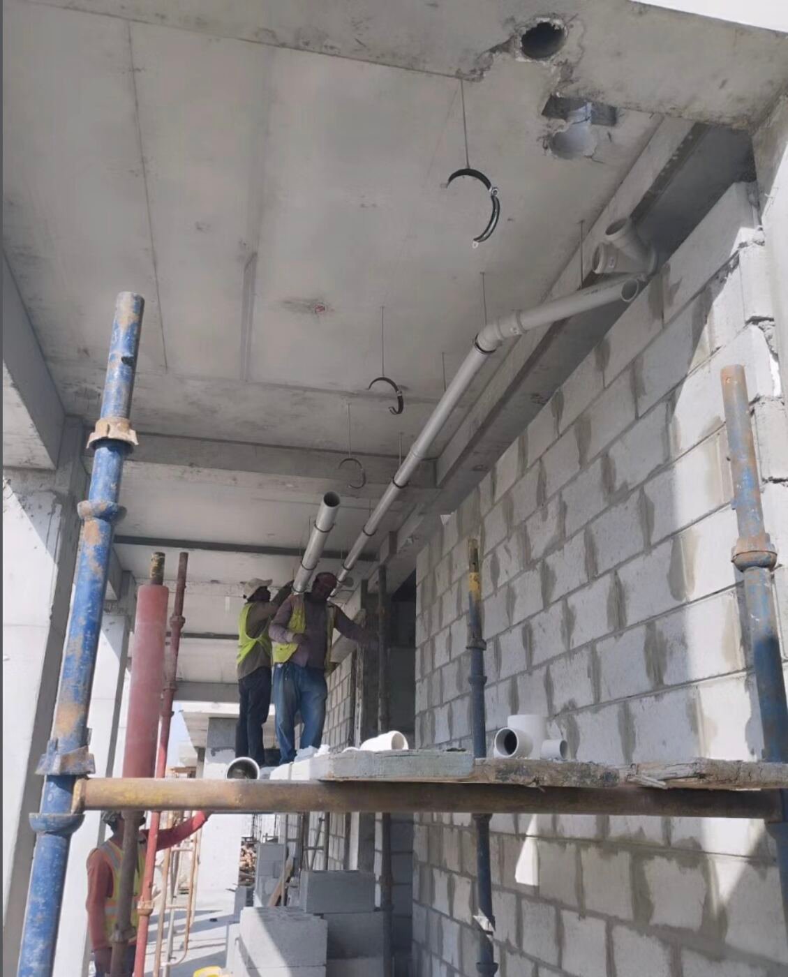 MEP conduit rough-in inside a Gravity Contracting site